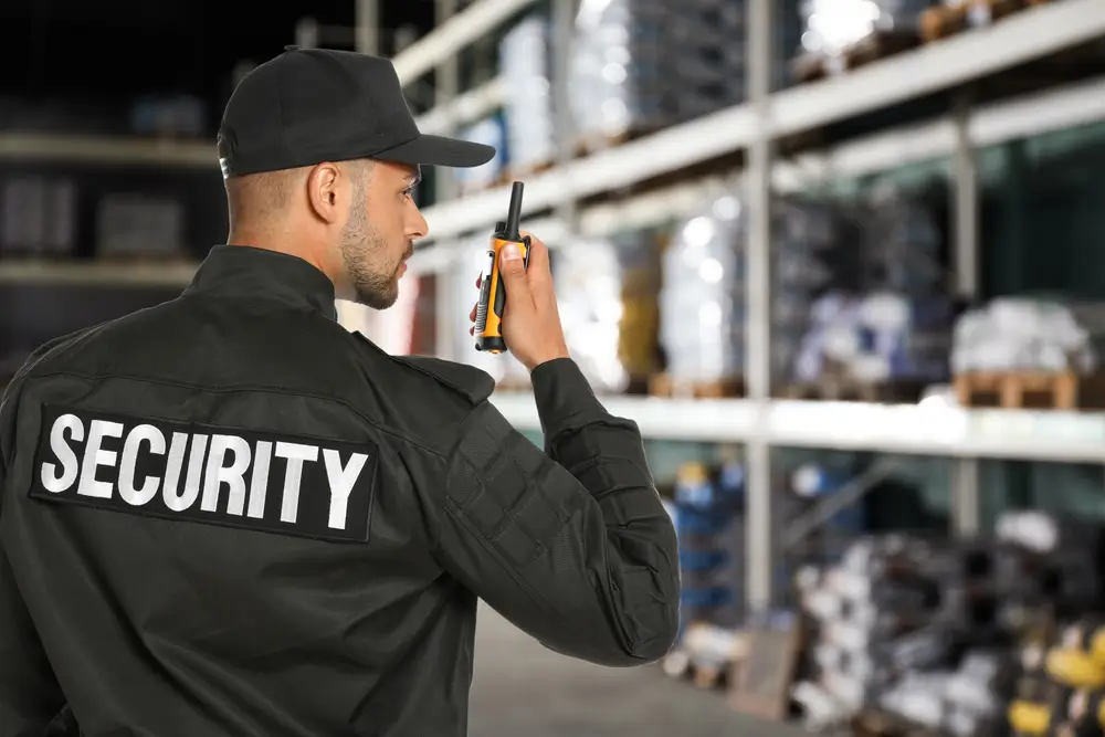 security guard keeping a warehouse secure