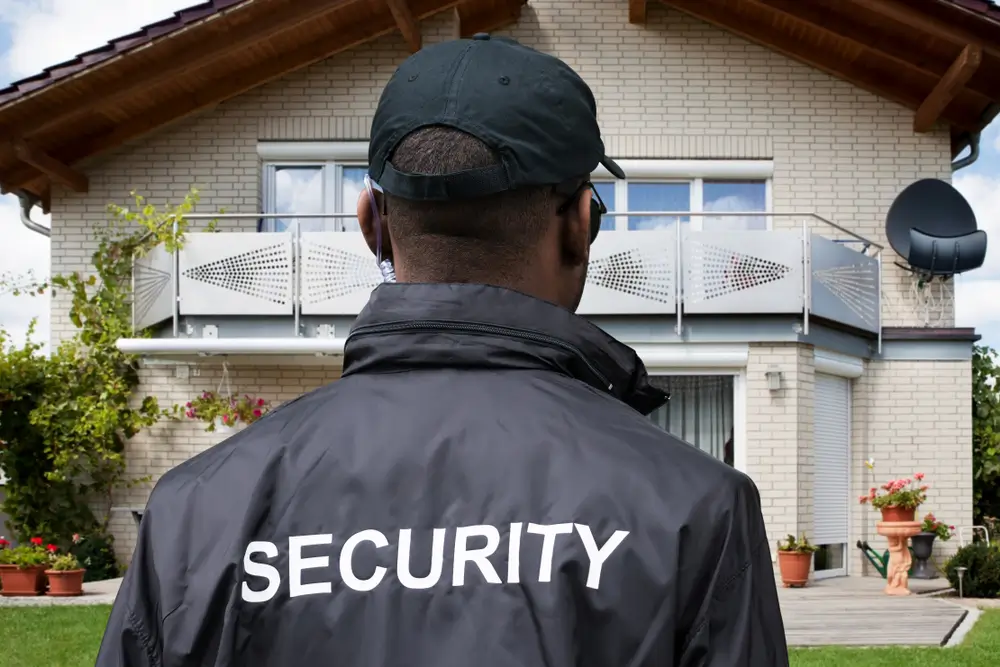 a security guard placed at a home to secure its suroundings